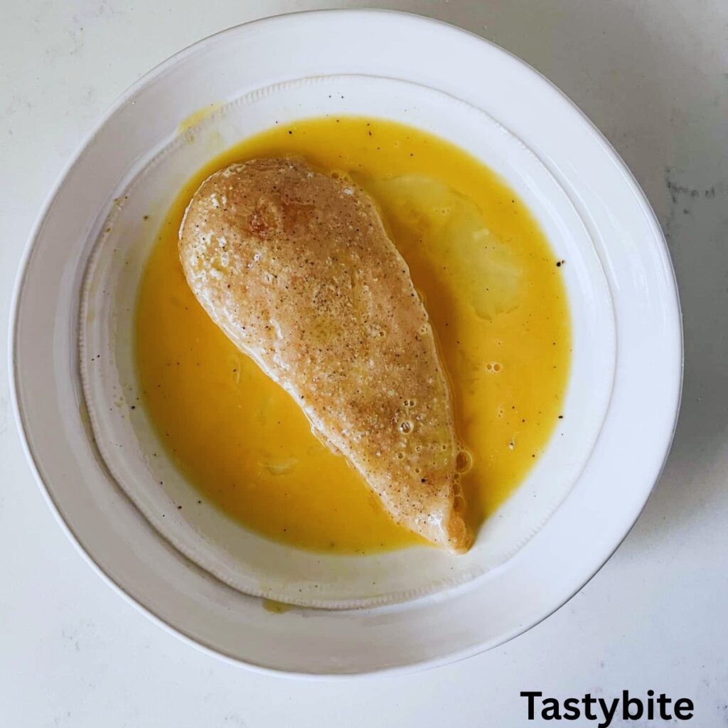 Chicken breast dipped in egg wash