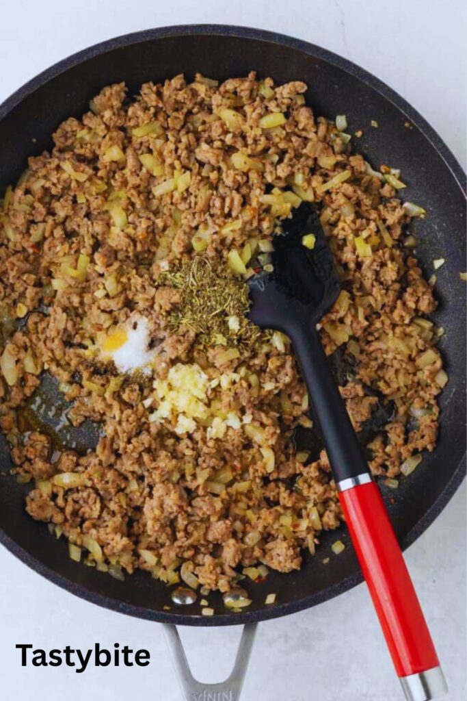 Mixing the garlic and seasoning