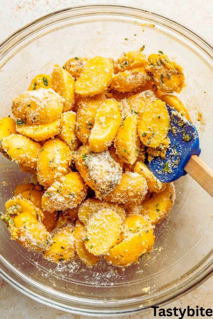 Coating cheese on potatoes