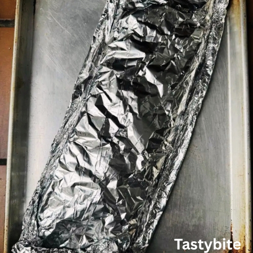 St. Louis Style Ribs covered in Aluminium foil