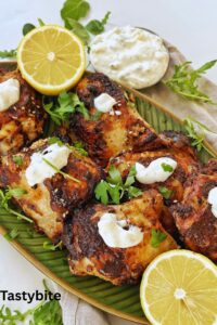 yogurt-marinated chicken thighs in an air fryer