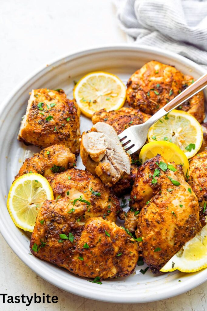 yogurt-marinated chicken thighs in an air fryer