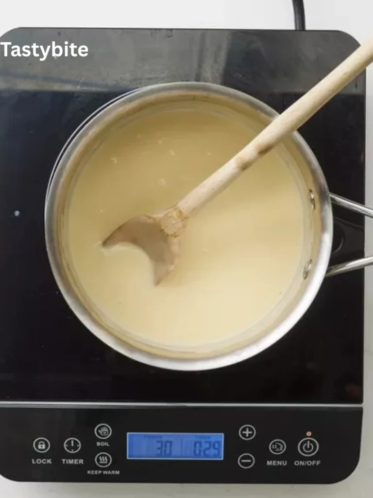 Stirring in the evaporated milk